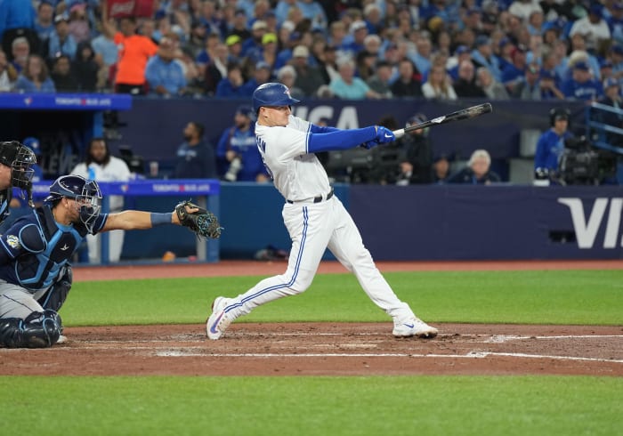 Toronto Blue Jays third baseman Matt Chapman hits a double against the Tampa Bay Rays during the third inning at Rogers Centre. (2023)